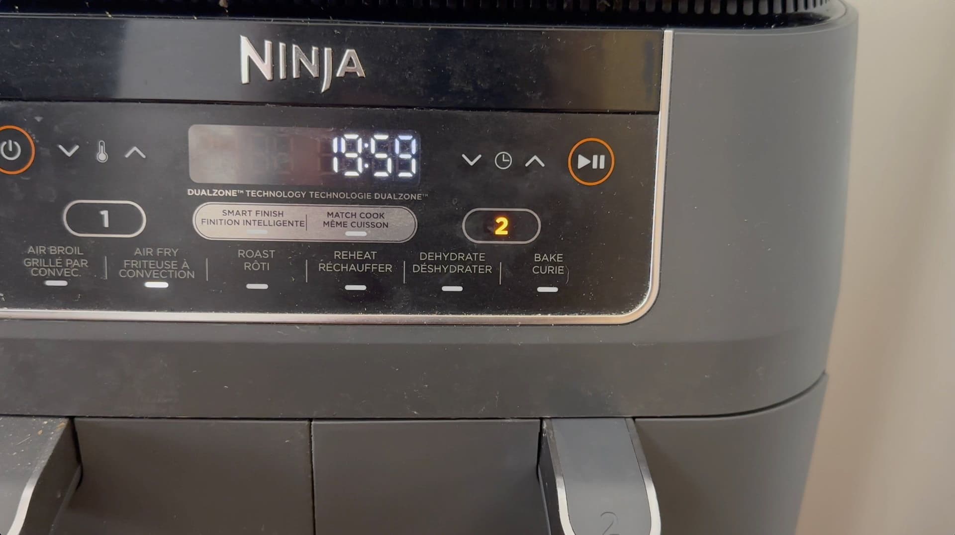 Ninja air fryer preheated to 360°F on the display screen ready for cooking.