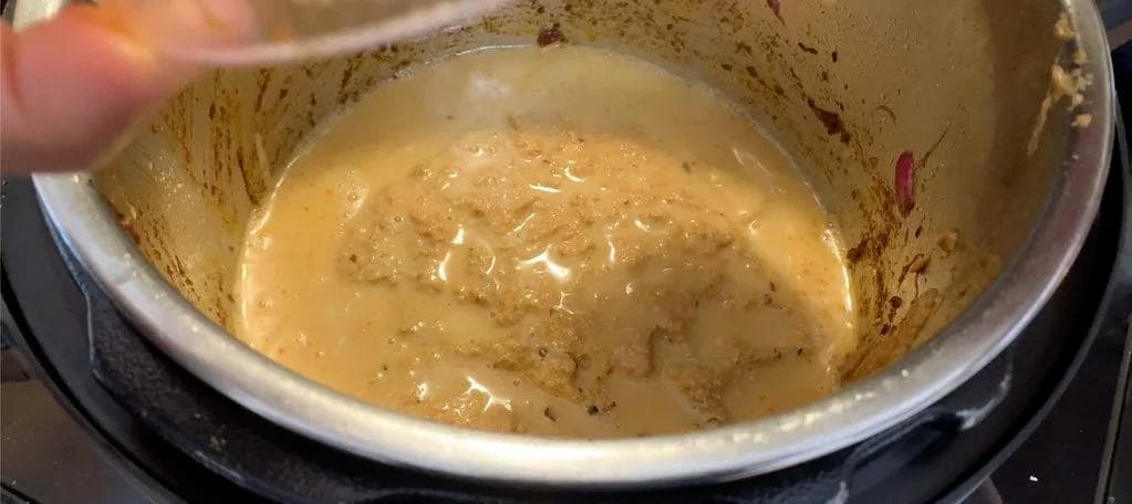 Smooth onion and spice puree in an Instant Pot, ready to be added back to the curry base for Chicken Changezi.