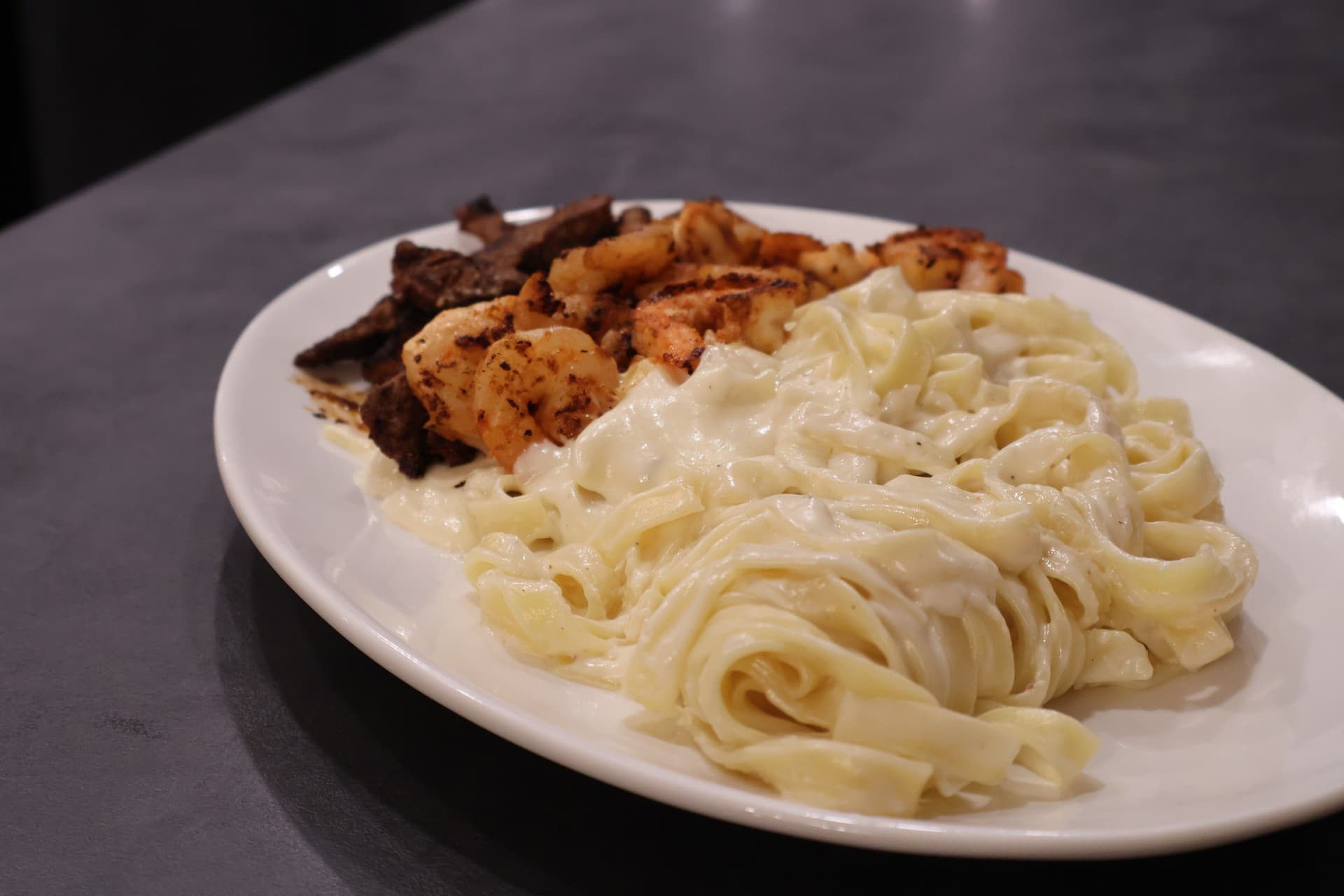 Bold Cajun Steak and Shrimp Alfredo Pasta Recipe