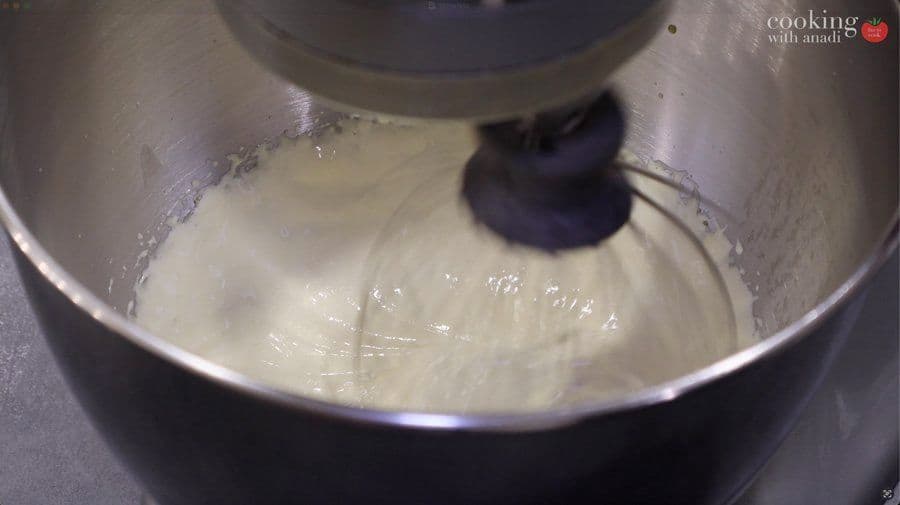 Egg yolks and sugar whisked to pale, thick ribbon stage in a stand mixer bowl