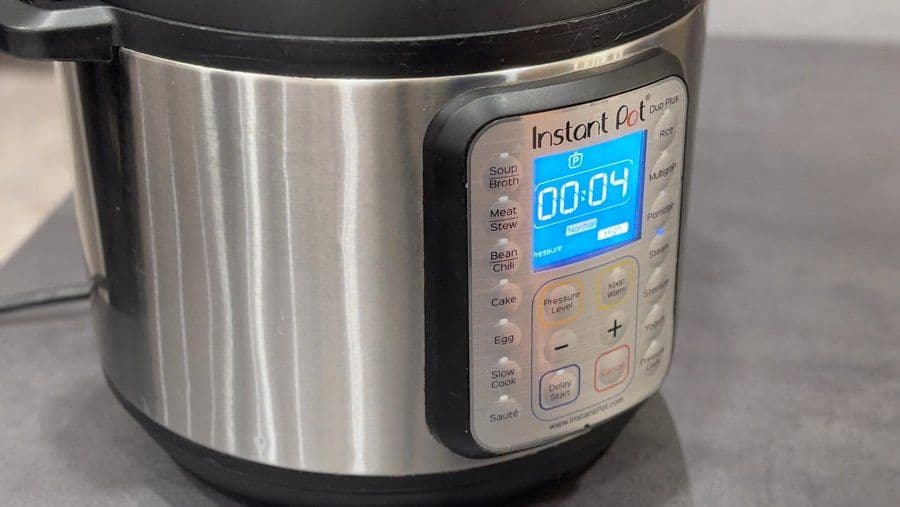 Instant Pot set to Steam mode for 4-5 minutes with timer display showing 00:04 for cooking baby potatoes.