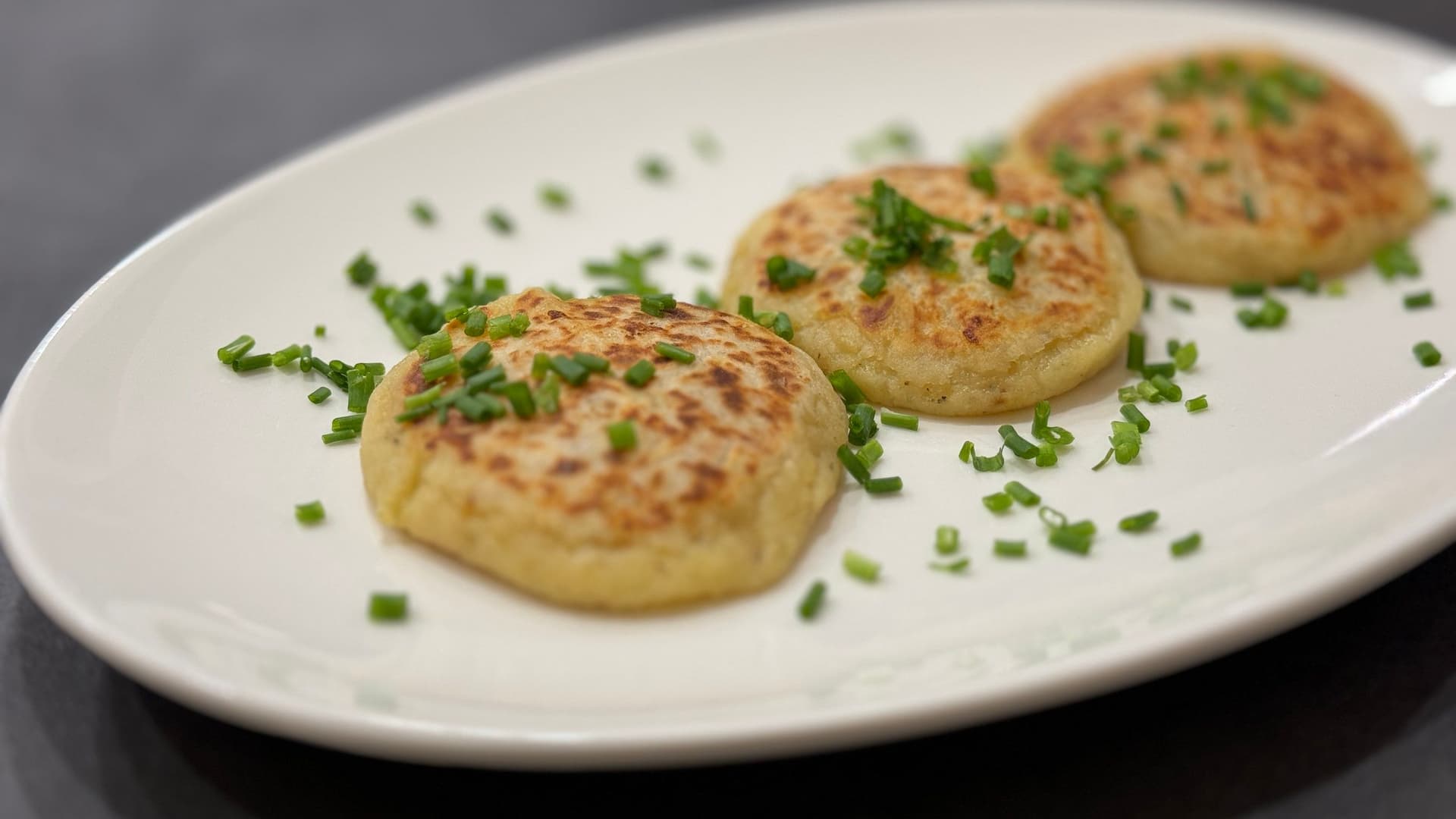 Llapingachos - Ecuadorian Cheese-Stuffed Potato Pancakes