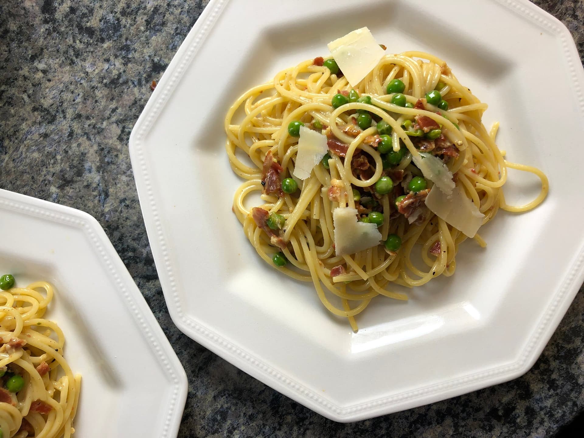 plate of spaghetti carbonara to demonstrate how starchy paste water bring together the sauce in a pasta dish