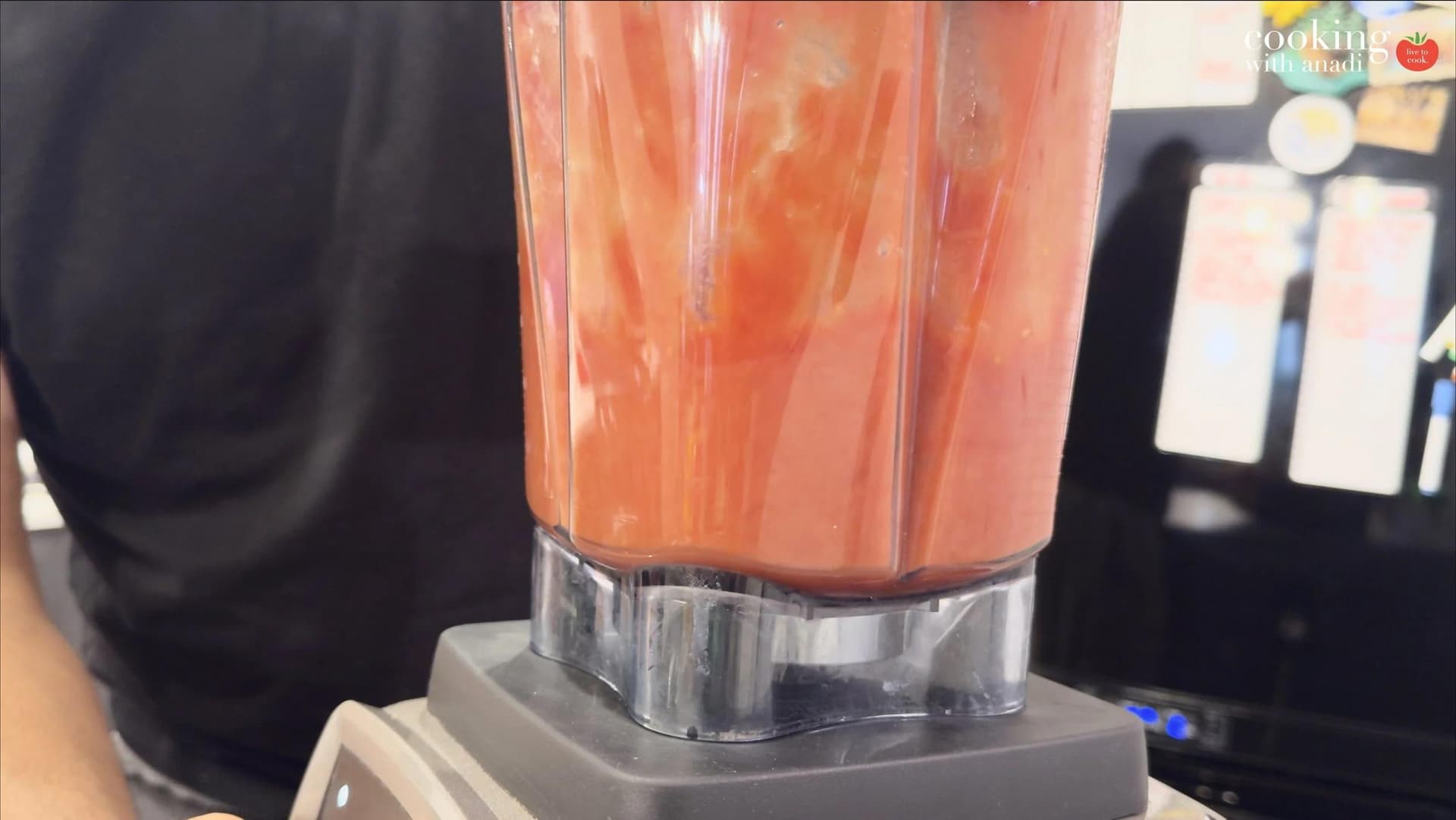 San Marzano tomatoes pulsed into a chunky red sauce inside a blender jar